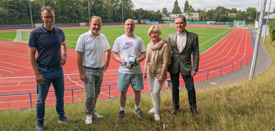 City of Beckum officials at the renovated Jahnstadion